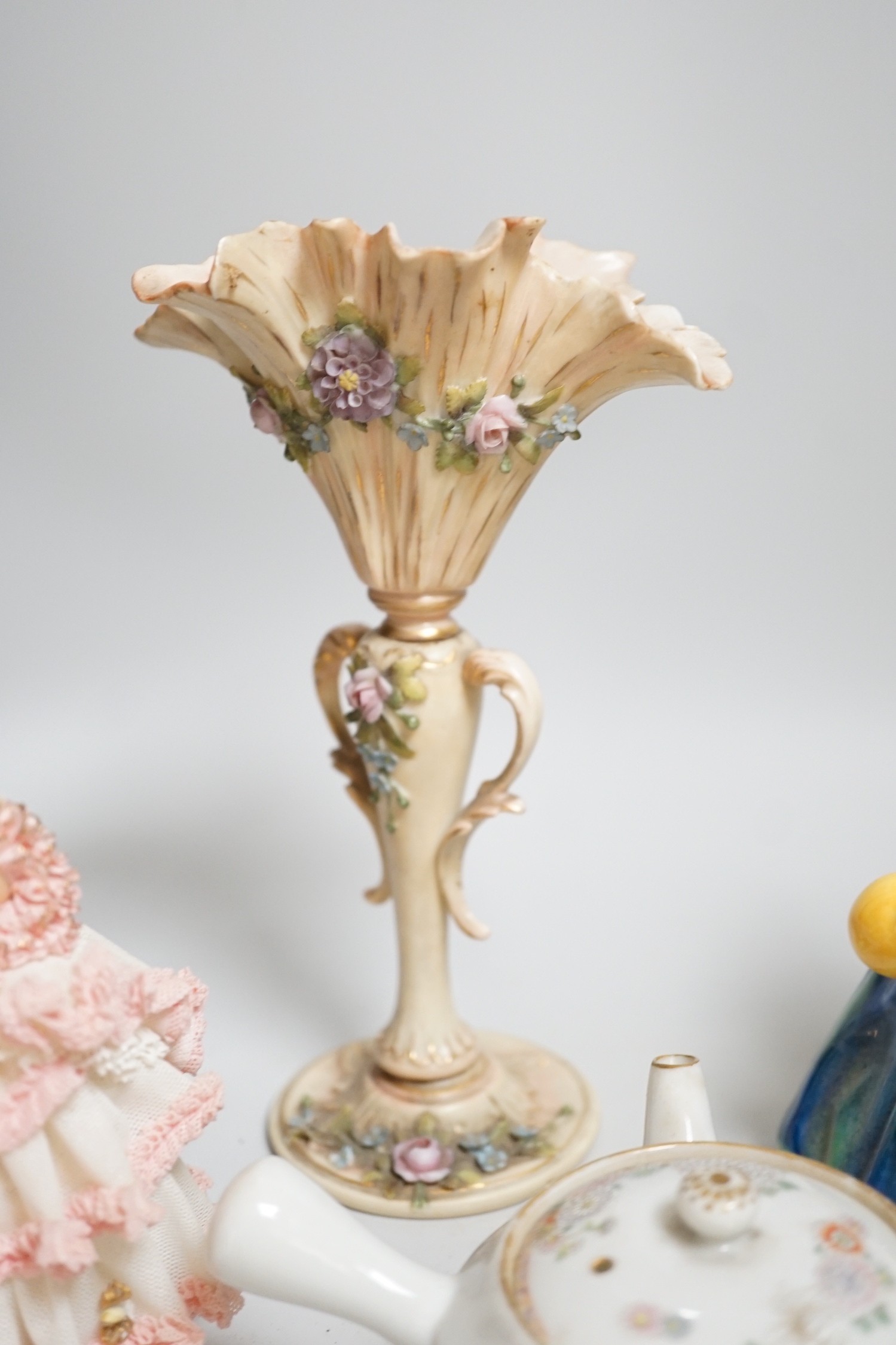 Continental porcelain figures, a Lalique figure of a crouched figure, etc.